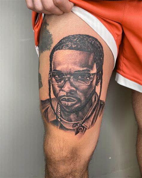 The release of his posthumous debut album, Shoot For the Stars Aim For the Moon, was. . Pop smoke tattoo
